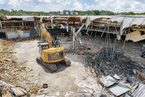 PAW Demolition excavator on demo day at Lakeland Publix teardown